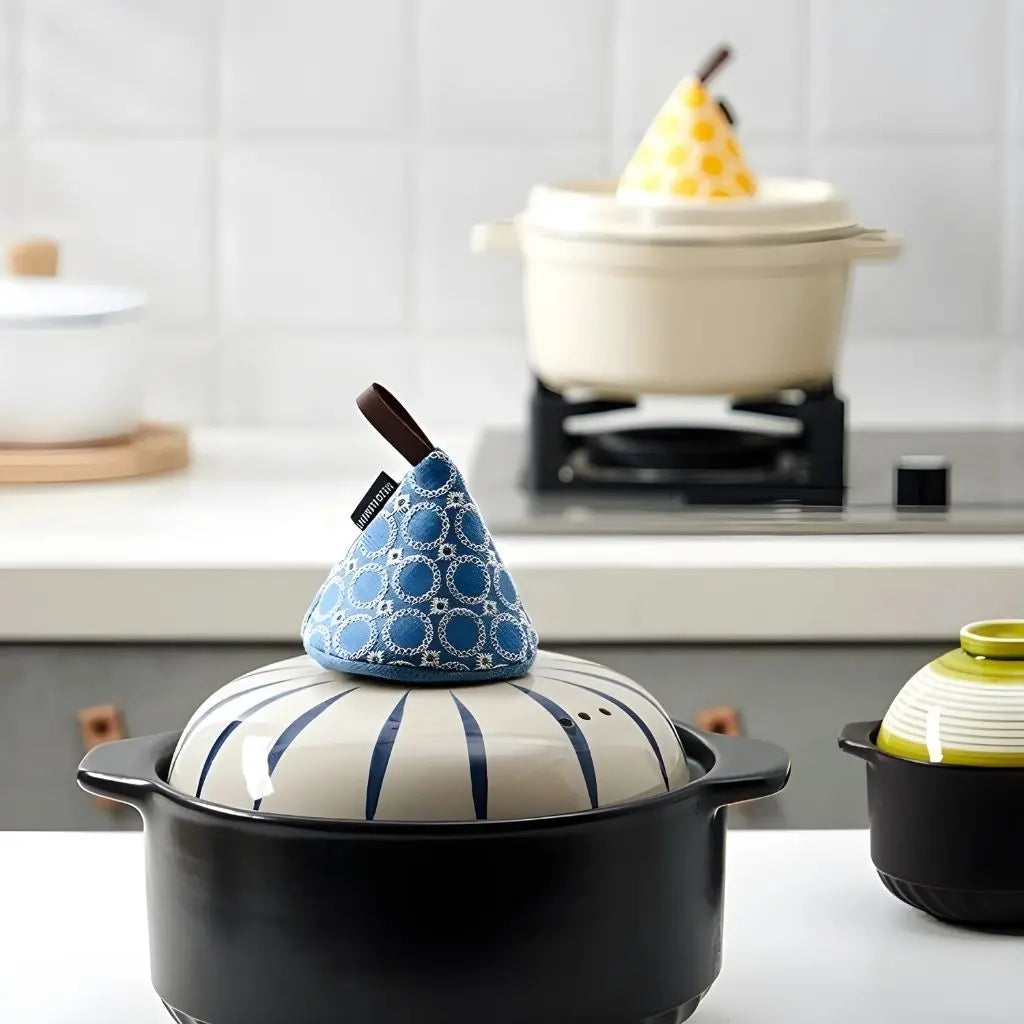 Heat resistant quilted mitts featuring Nordic cone design for safe cooking and baking tasks