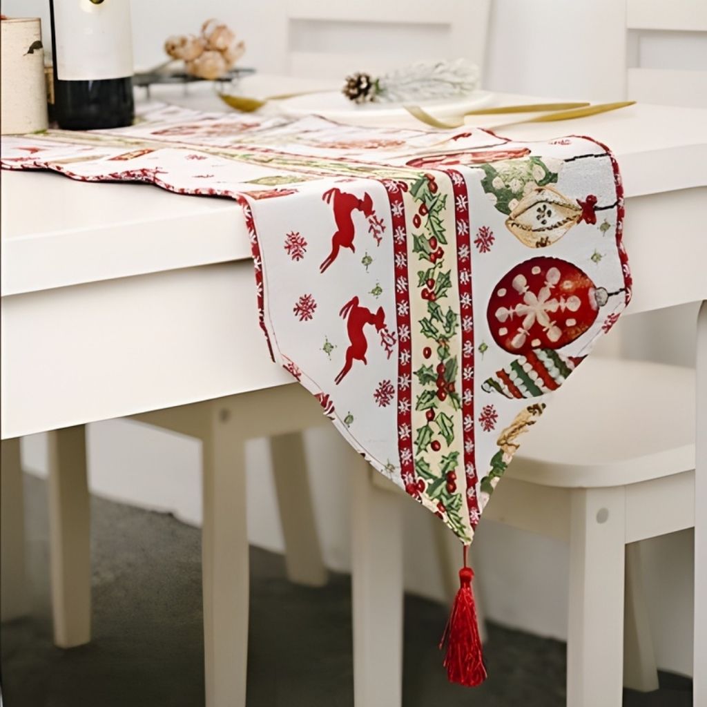 Woven holiday table runner with rich tapestry design and decorative ends