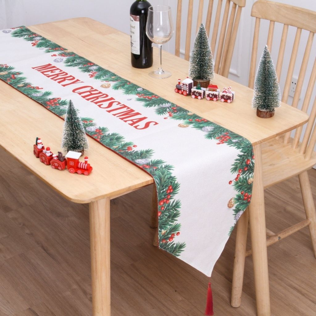 Christmas dining table runner with red holiday motifs and soft flannel material