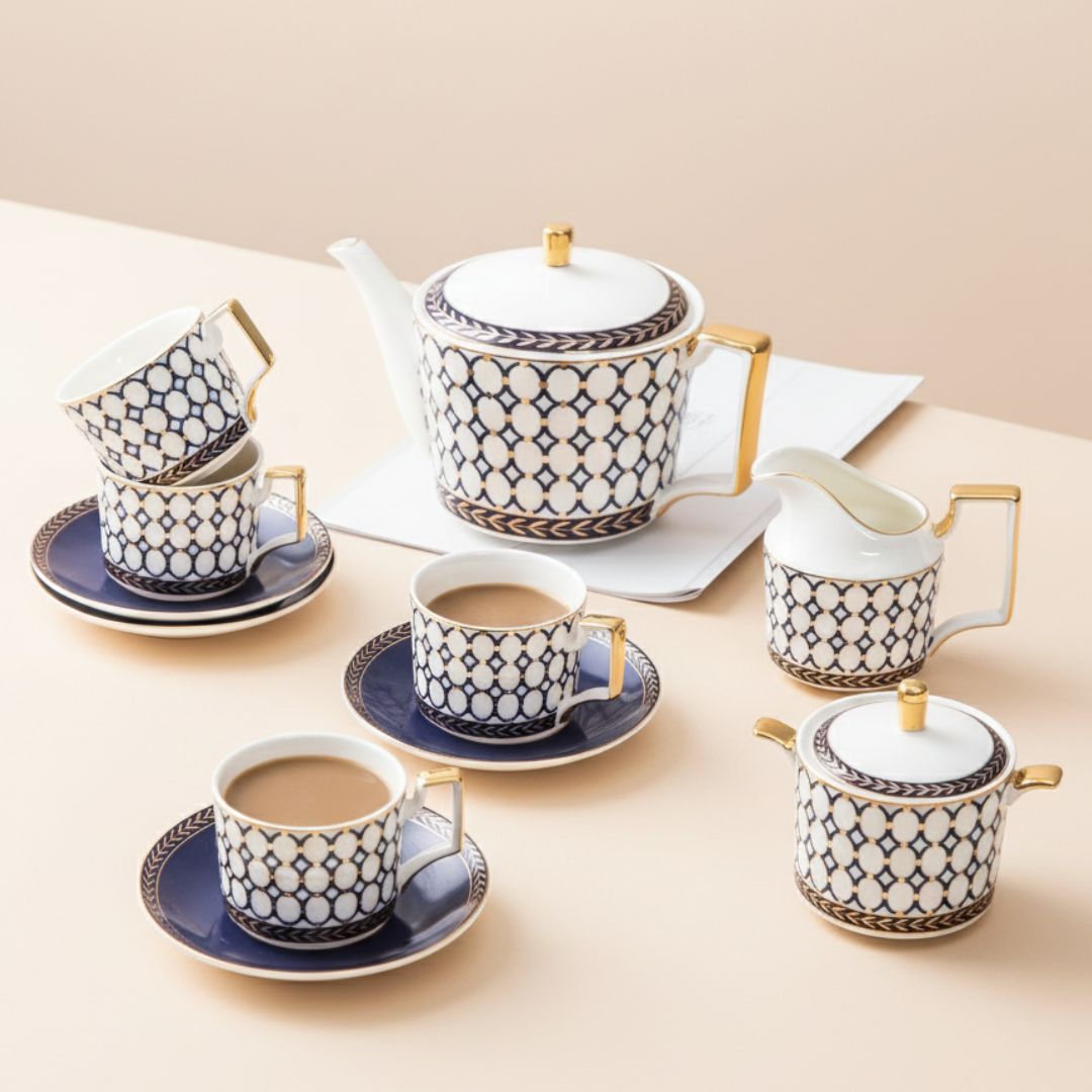 Ceramic coffee and tea set with white porcelain cups and bone china teapot