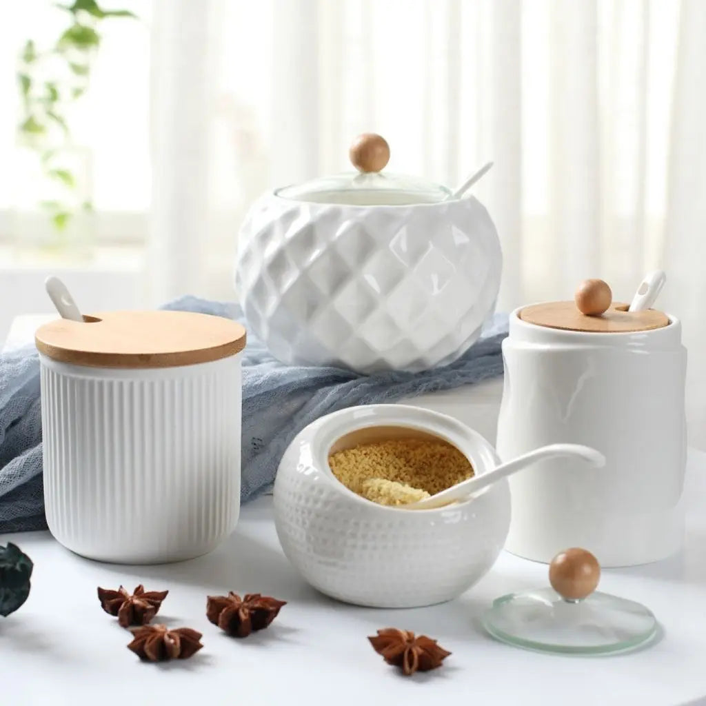 Spice storage jar crafted from ceramic with bamboo lid and spoon for efficient kitchen organization