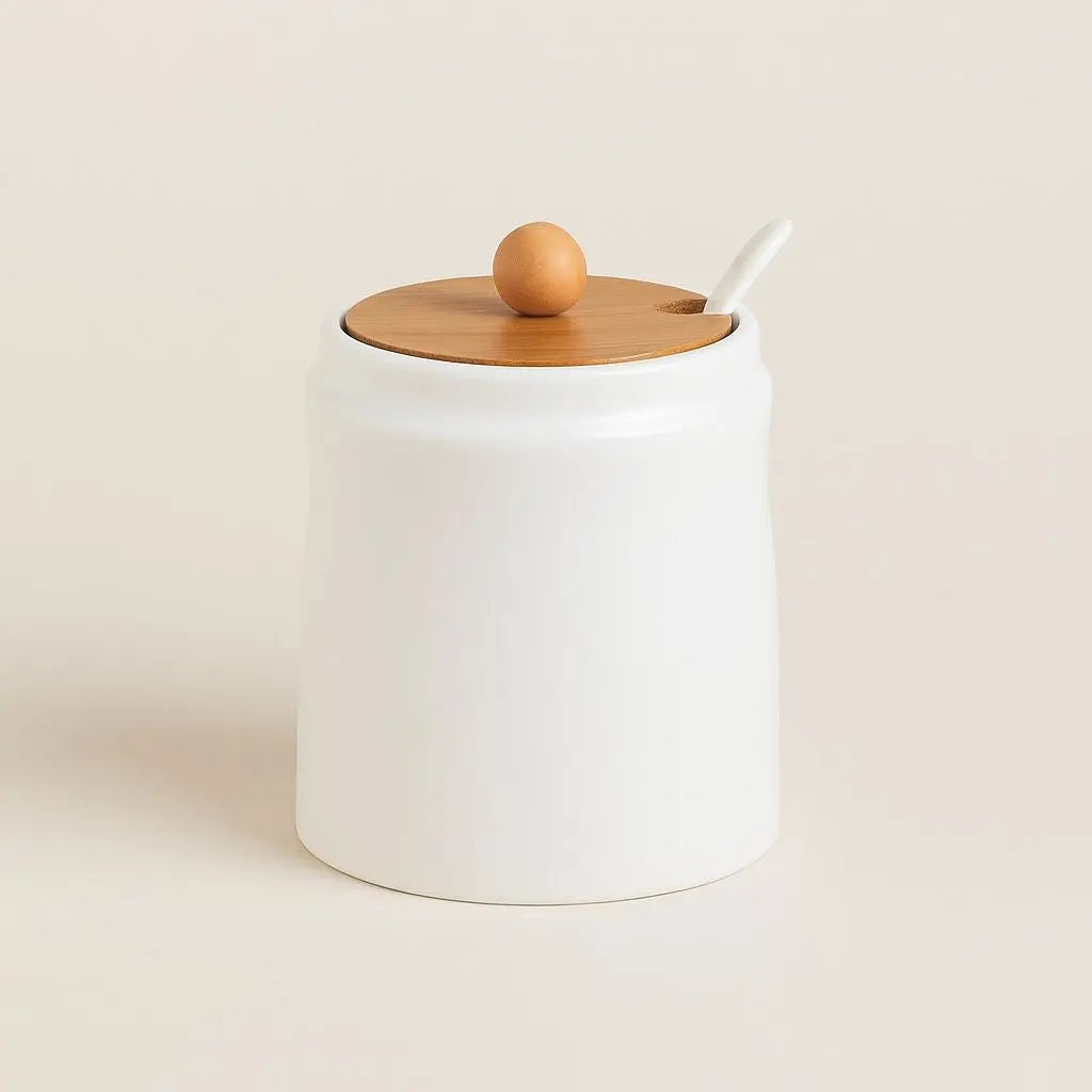 Handcrafted ceramic seasoning storage jar with natural bamboo lid designed for modern kitchen organization