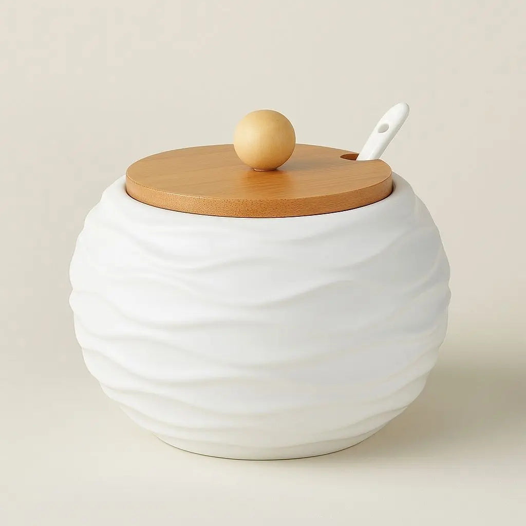 Ceramic condiment jar with bamboo lid and wooden spoon perfect for sugar, salt, and spice storage