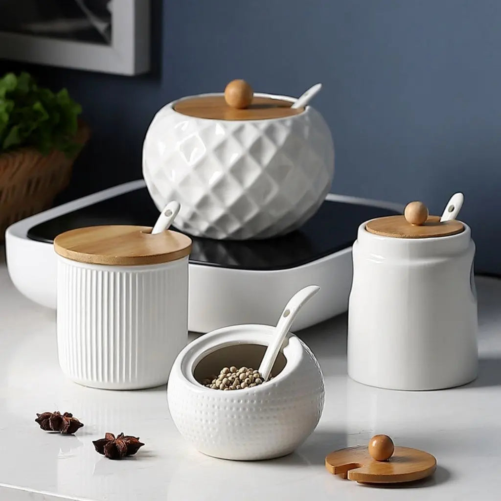 Ceramic kitchen jar with bamboo lid and included spoon for neat seasoning and condiment storage solutions