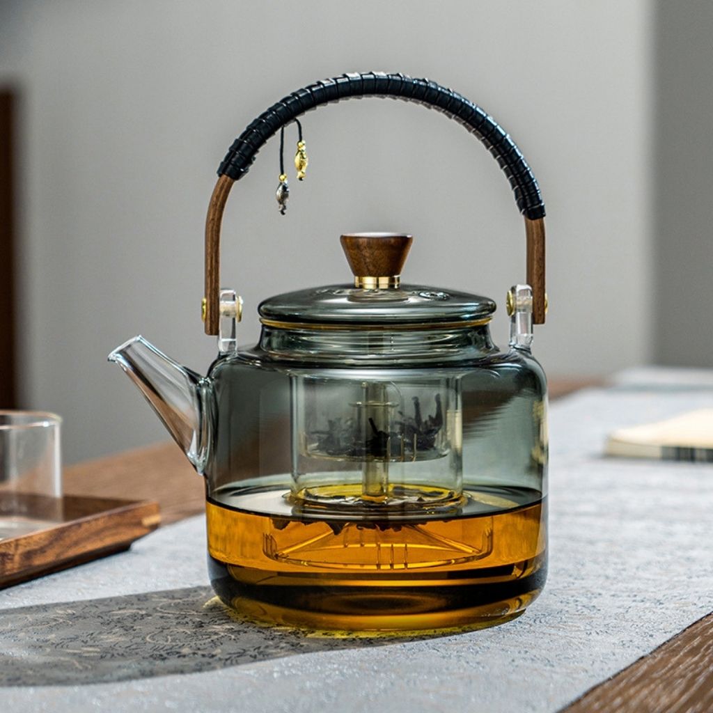 Modern glass teapot set with minimalist design and transparent body