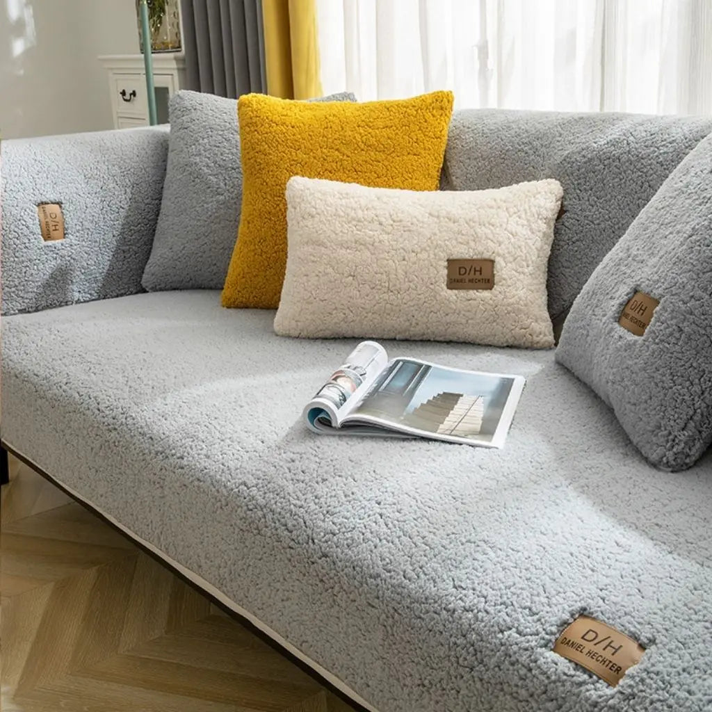 Anti-slip couch cover made from wool fiber providing seasonal warmth and furniture protection