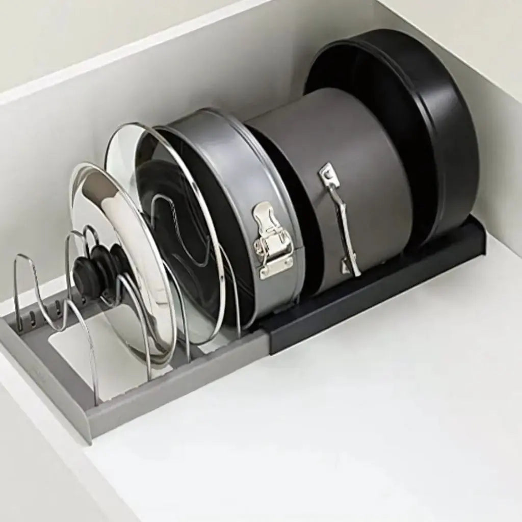 Adjustable pot lid holder with stainless steel construction for organized kitchen cabinets.
