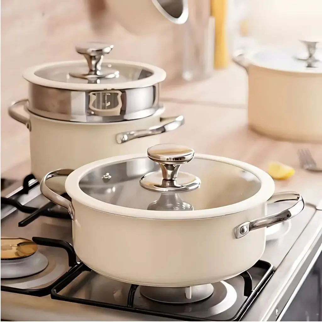 Cookware featuring tempered glass lids with steam vents for optimal cooking control