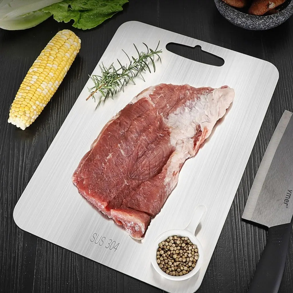 Food-safe steel kitchen prep board with non-porous surface designed for easy maintenance and cleaning