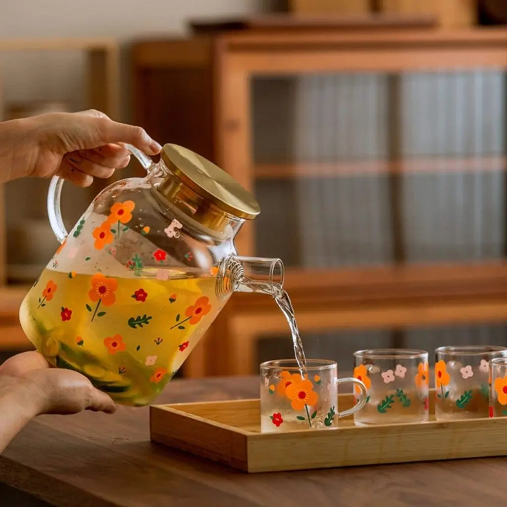 Thermal resistant glass tea set with elegant floral kettle design for perfect tea brewing
