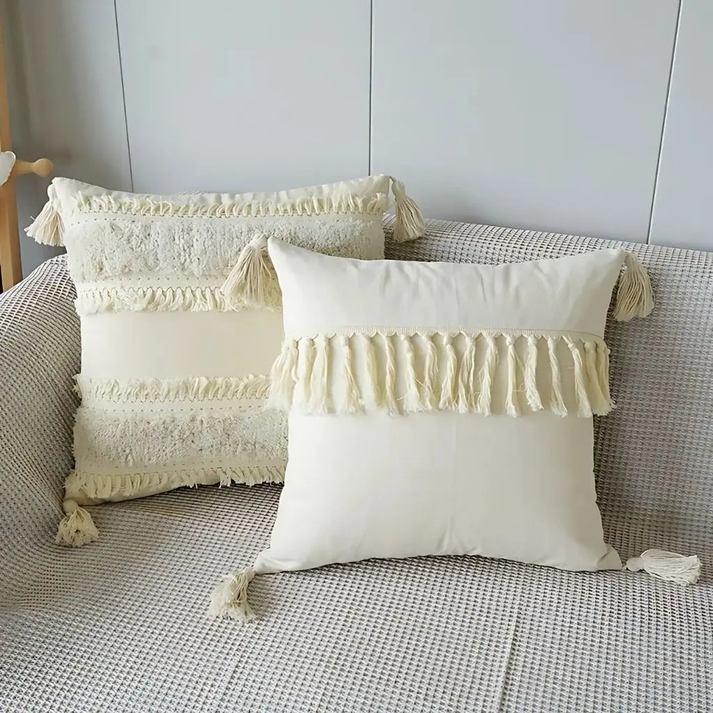 Boho pillow covers featuring tufted texture and tassel trim for distinctive home textiles