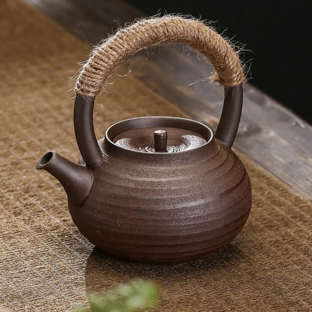 Traditional ceramic brewing pot with cultural pottery design, ideal for authentic tea preparation rituals