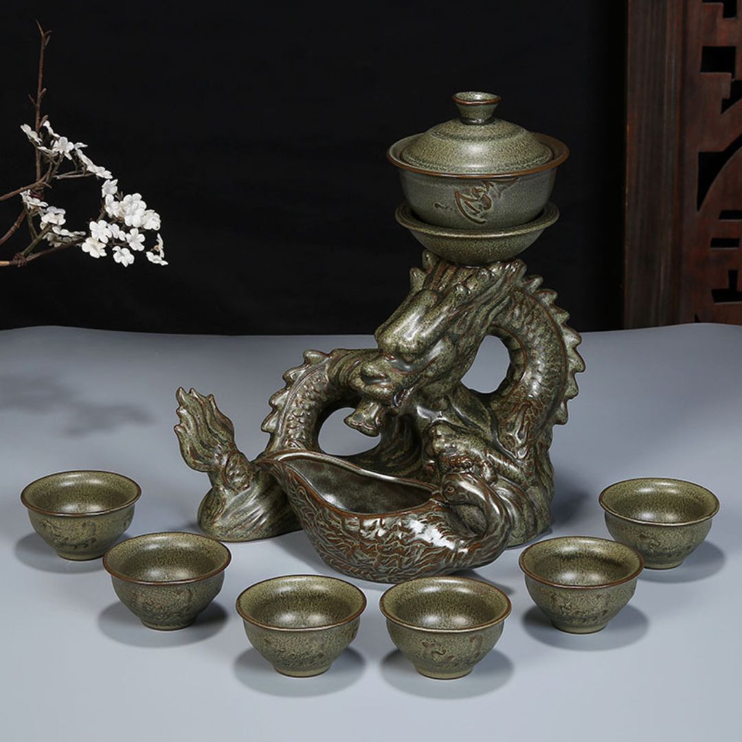 Gongfu porcelain tea accessories with dragon figurine base and ceramic teacup