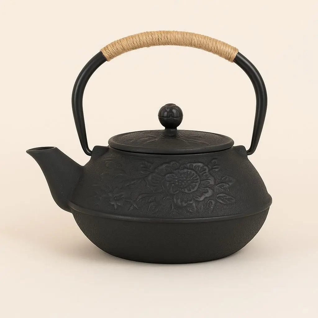 Hand-painted floral cast iron teapot showcasing intricate cultural artistry and traditional craftsmanship