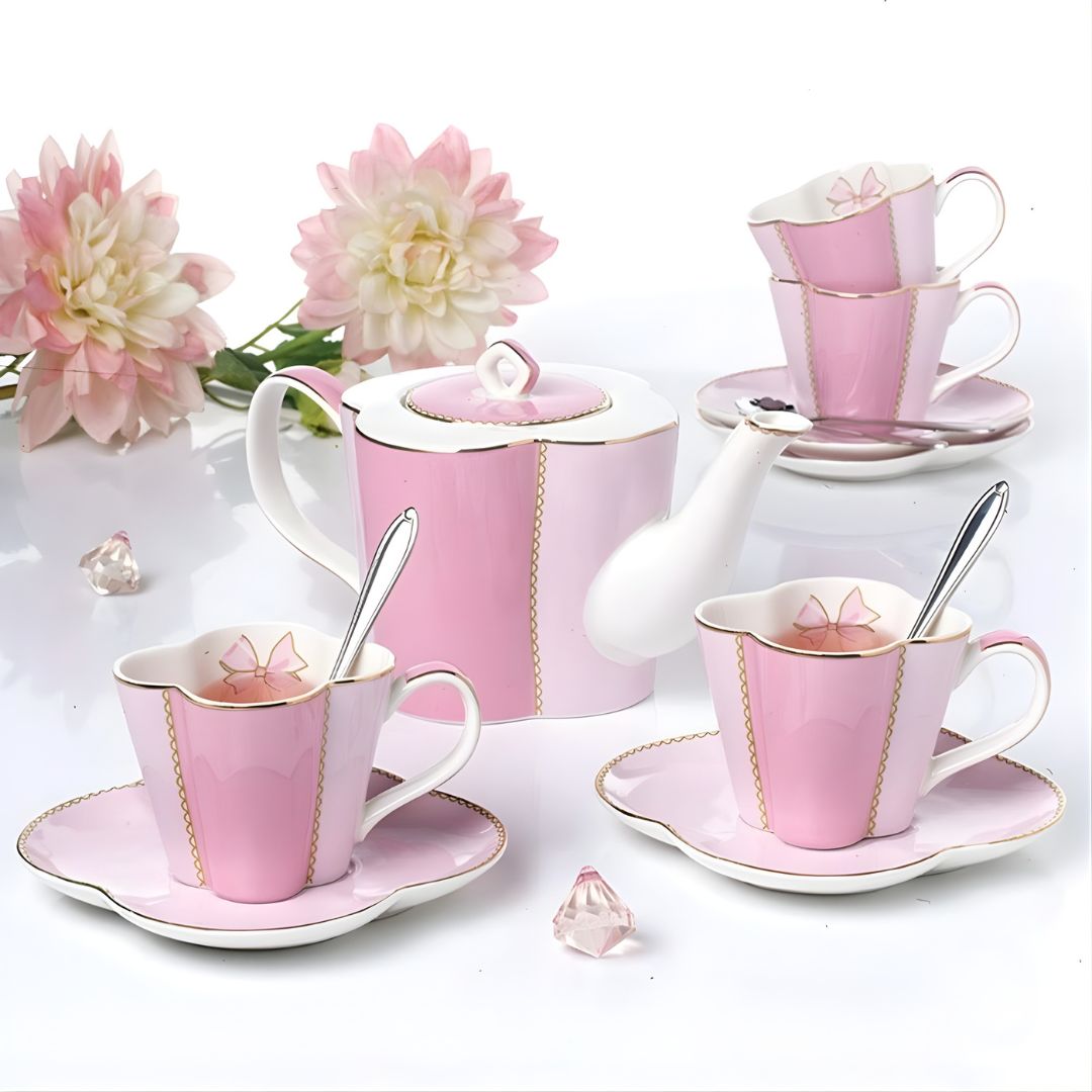 Complete ceramic tea set for four with teapot cups saucers and spoons