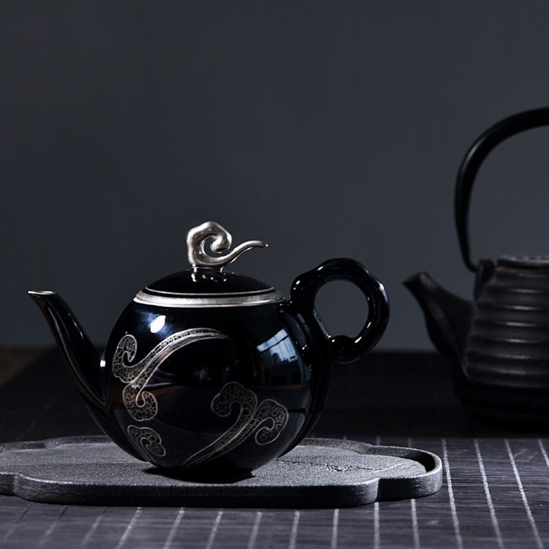 Small black ceramic teapot 8oz capacity with ergonomic handle for single serve brewing