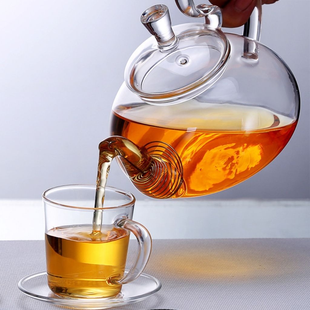 Glass teapot with removable infuser for blooming and loose leaf tea preparation