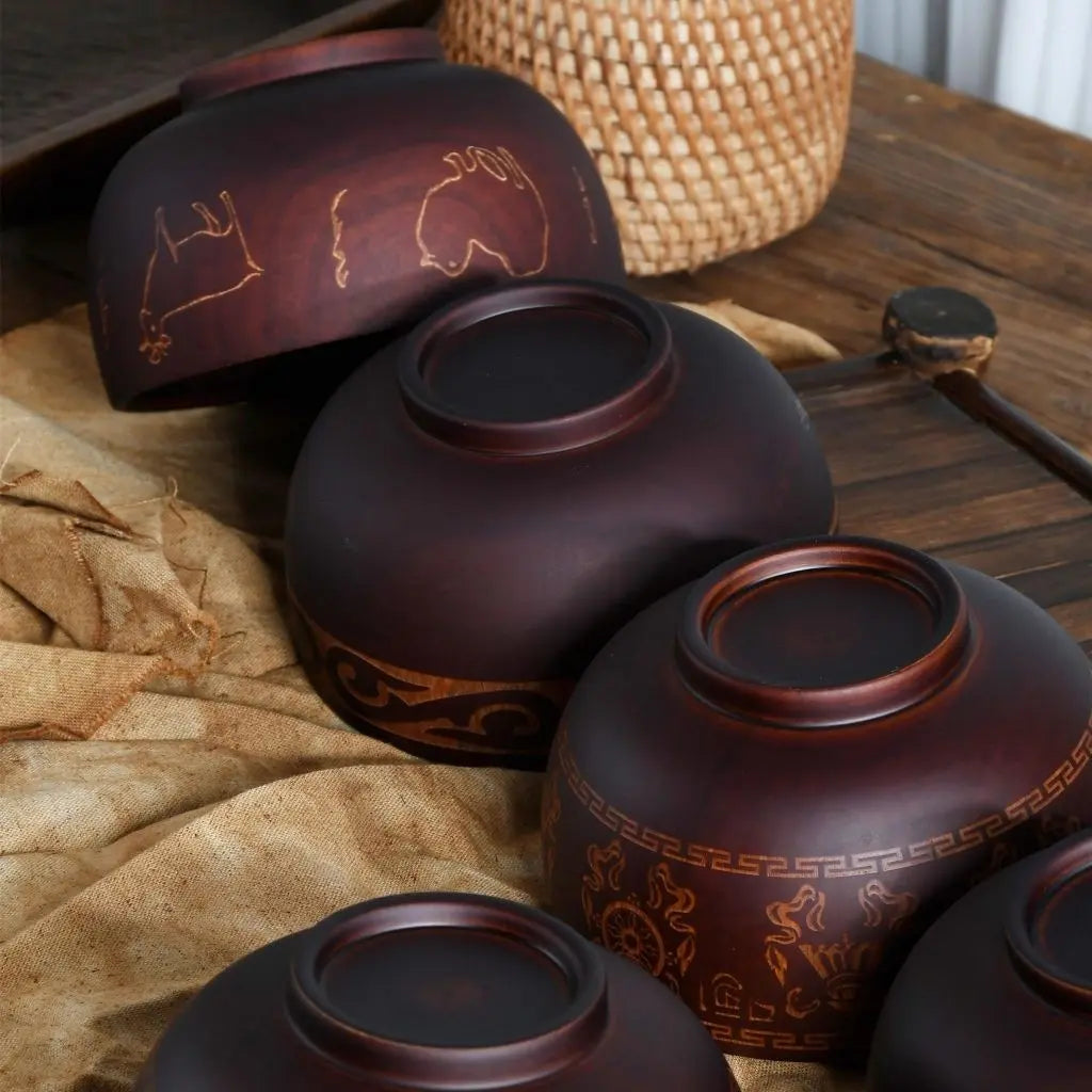 Close-up of hand carved ethnic patterns showcasing traditional wooden craftsmanship and cultural motifs