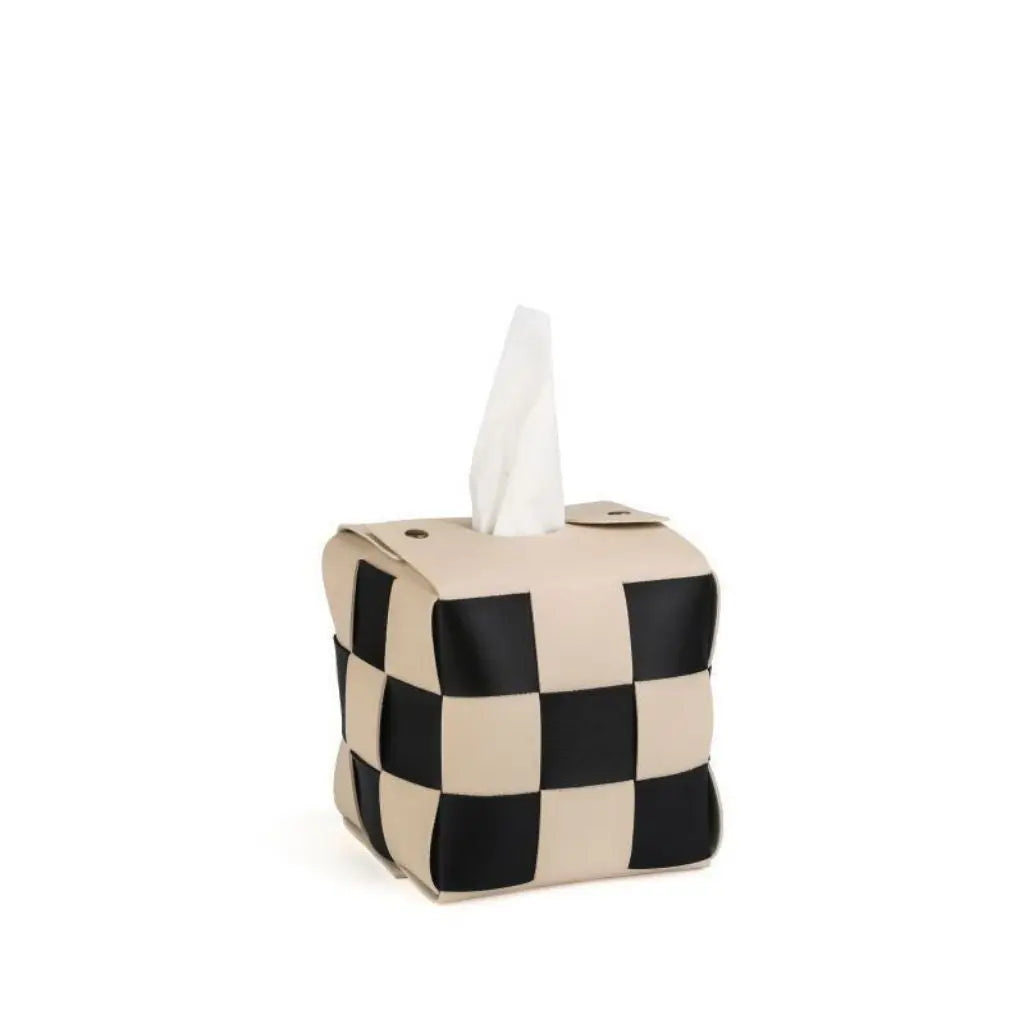 Graphic checkered tissue cover with interwoven panels designed for easy tissue refills and style