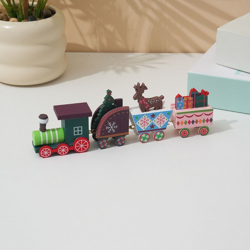 Wooden Christmas train with colorful hand painted carts displaying holiday motifs and decorations