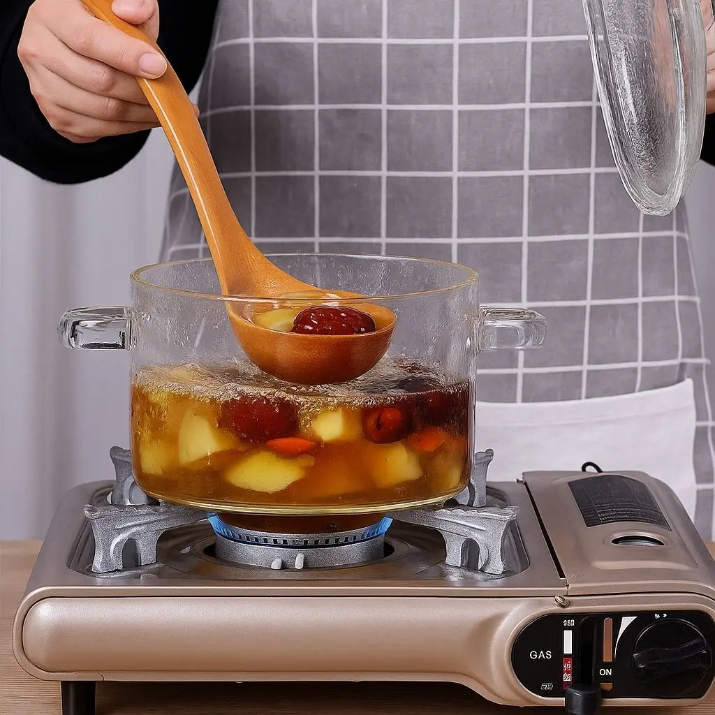 See-through borosilicate glass cooking pot allowing easy food monitoring without lifting the lid