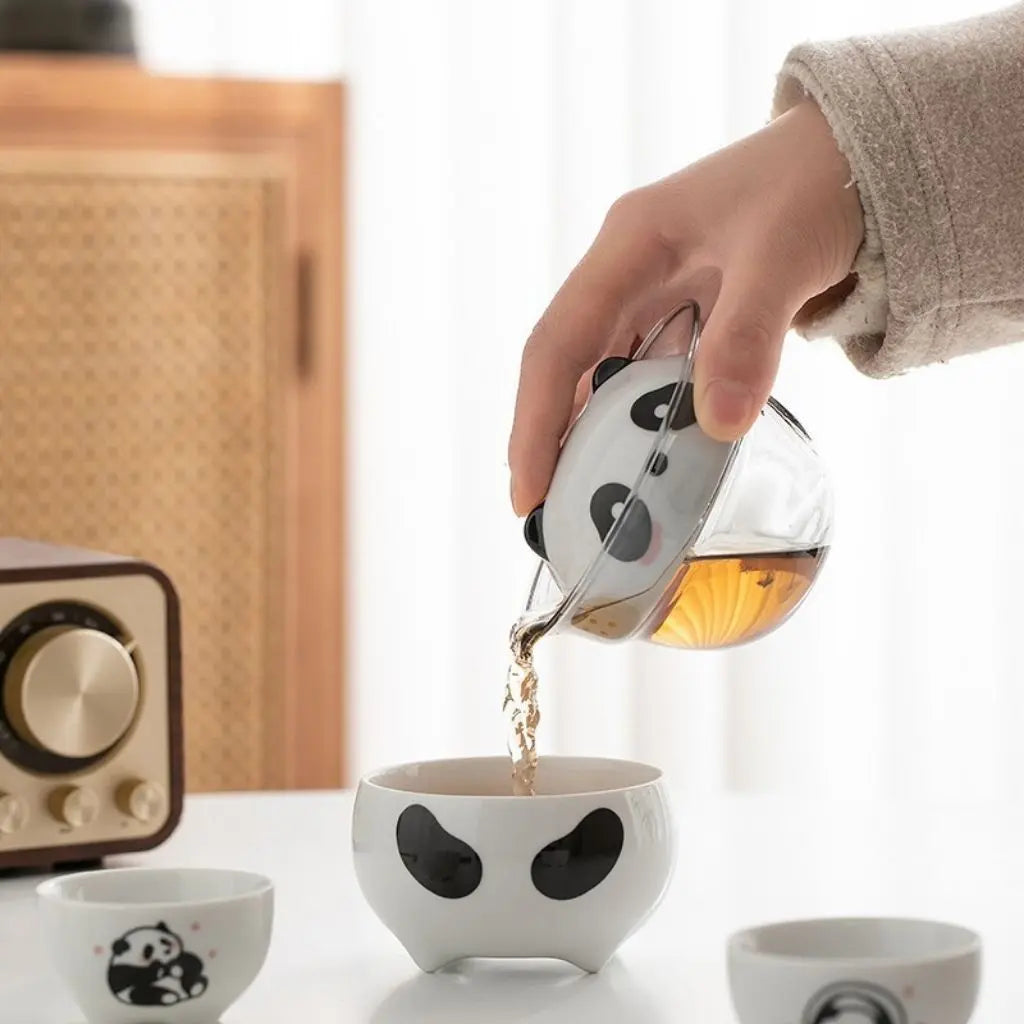 Complete ceramic tea kit with panda teapot master cup tasting cups and portable travel case for tea lovers