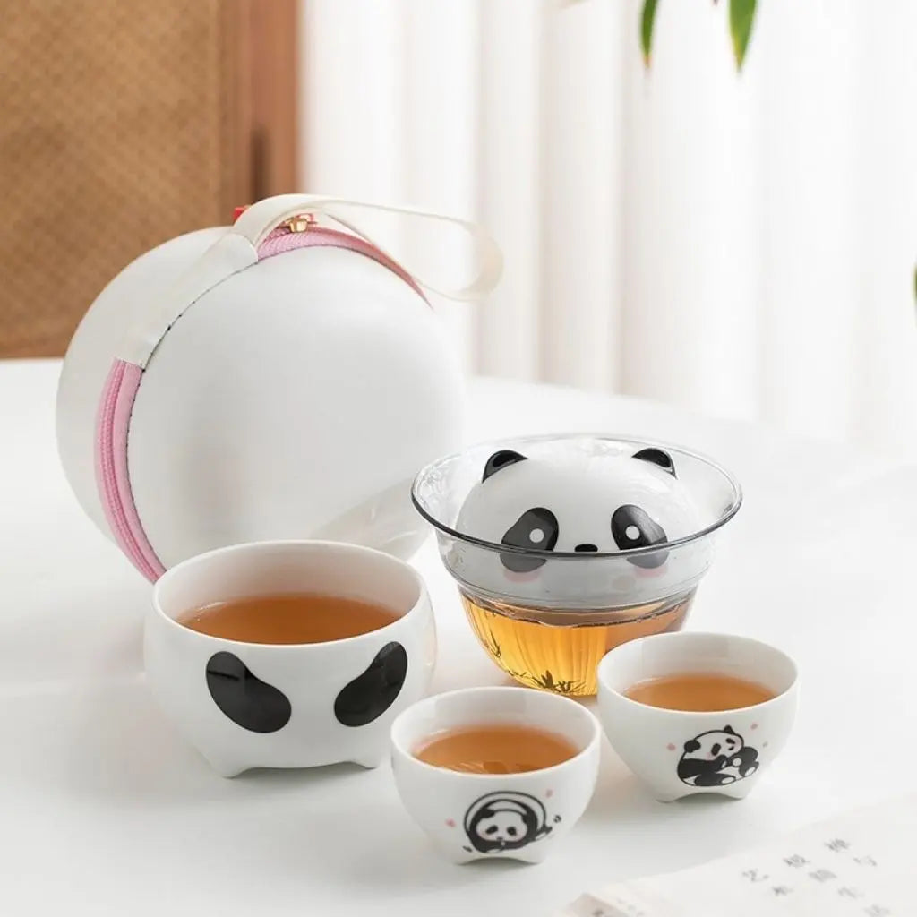 Portable ceramic tea set with cute panda teapot and cups in compact travel case for tea lovers