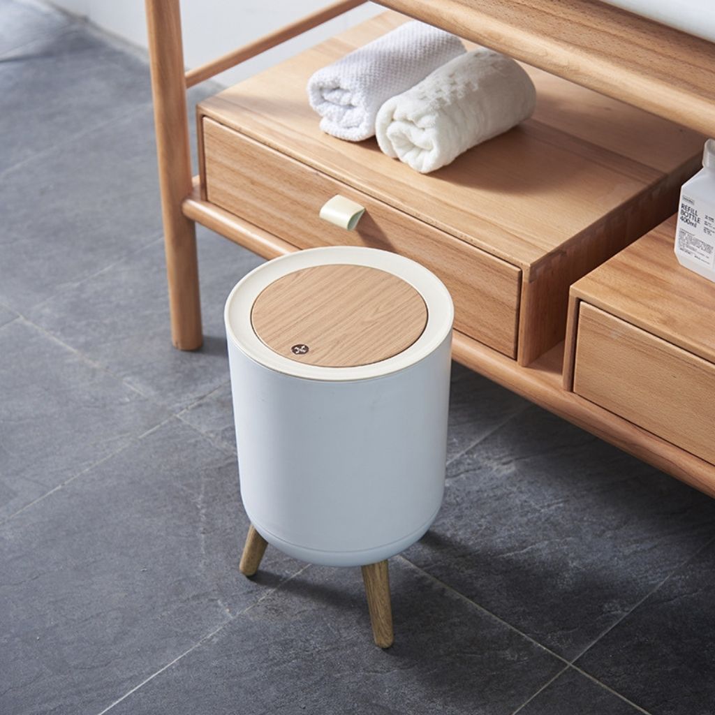 Nordic push lid trash can with wooden tripod legs for modern kitchen and bathroom waste disposal