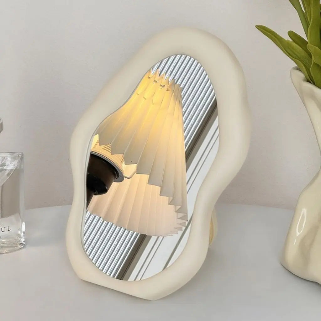 Irregular cloud mirror showing versatile wall mount capability with contemporary sculptural appeal