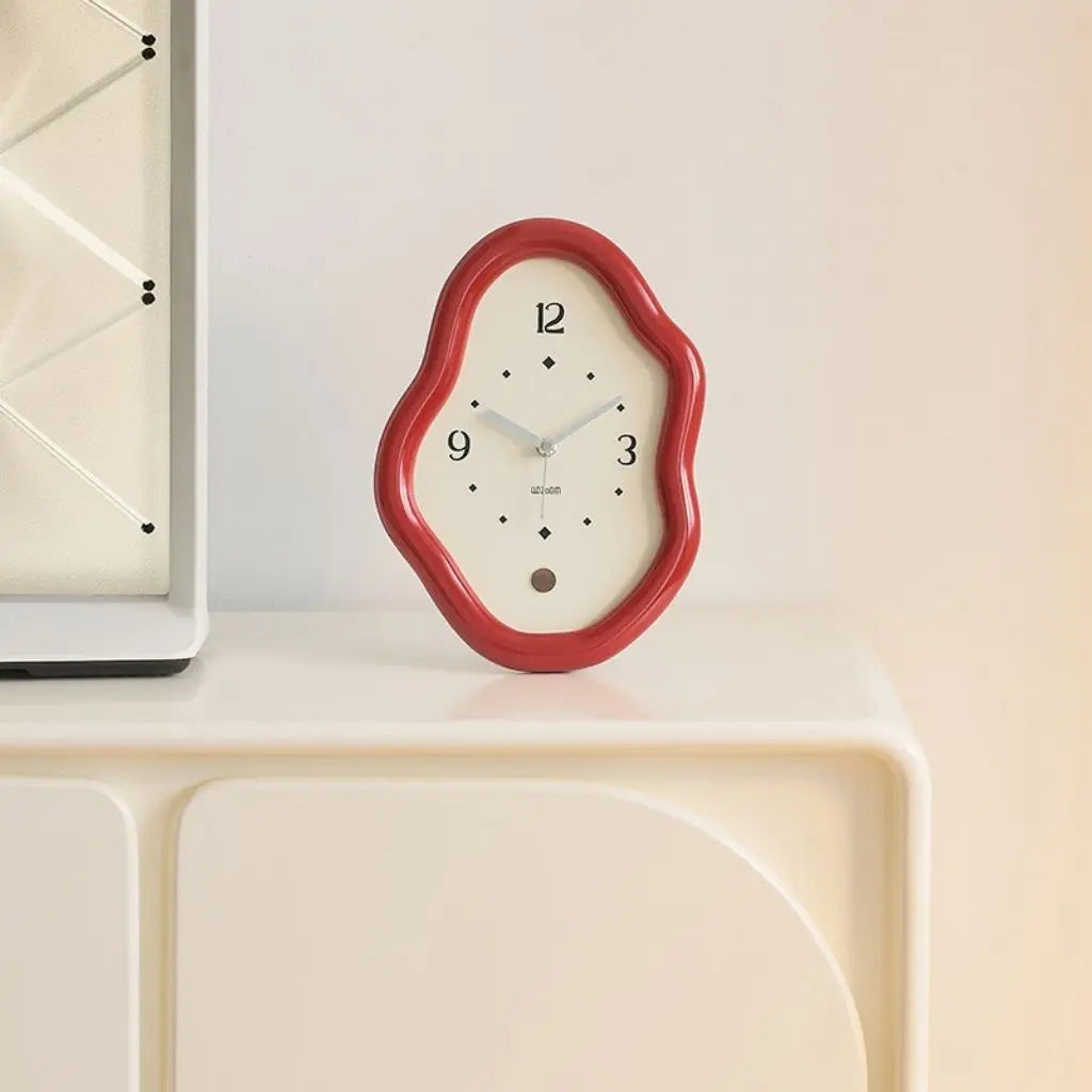 Minimalist wooden clock face with simple number markers, combining functional timekeeping with artistic design