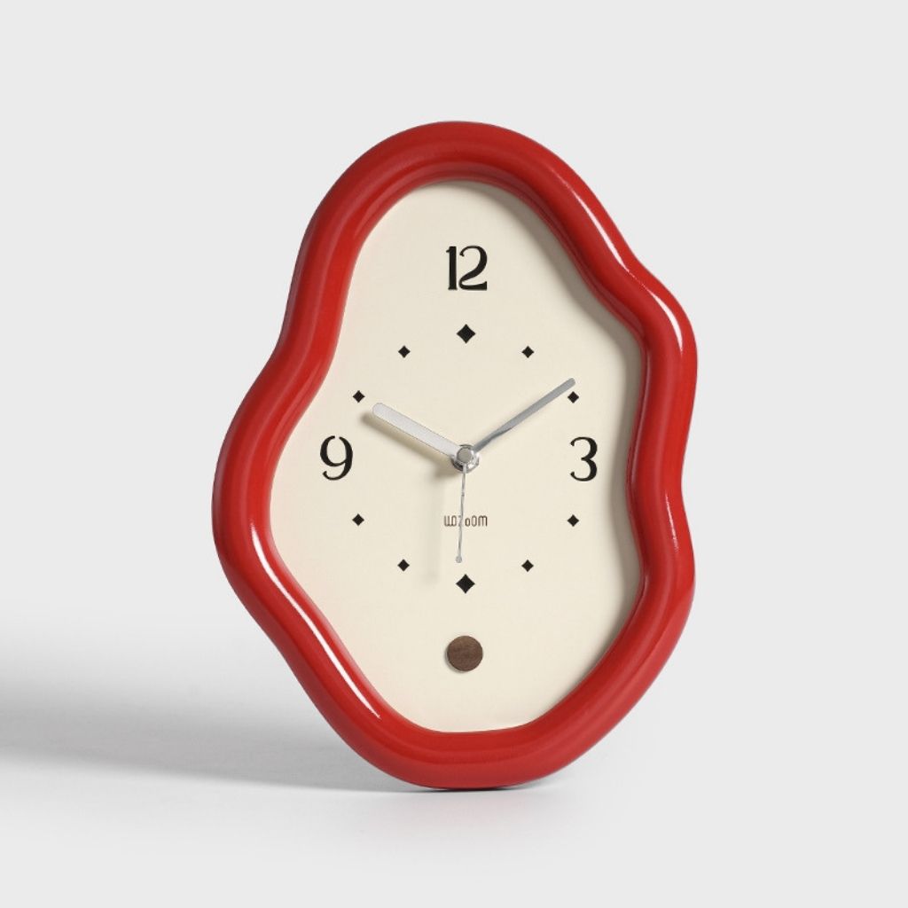 Curved wooden table clock showing asymmetrical organic shape with smooth finish for modern home decor