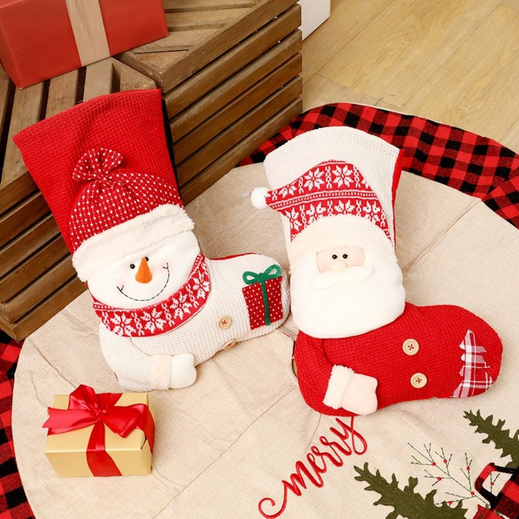 Knitted christmas stocking with structured form and decorative top edge