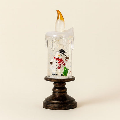 Illuminated winter lantern showing glowing particles in motion on white background