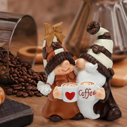 Coffee gnome figurine pair with molded details and tall hats holding cups