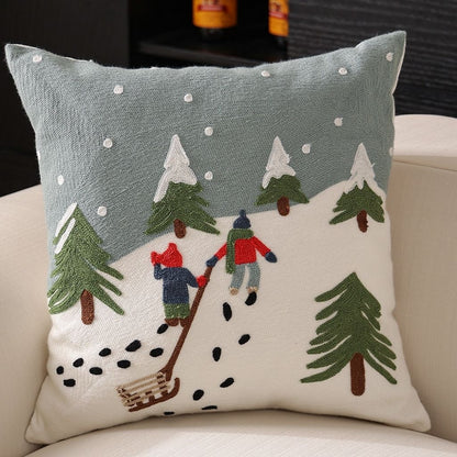 Red cushion cover with embroidered Christmas gift box and snowflake pattern