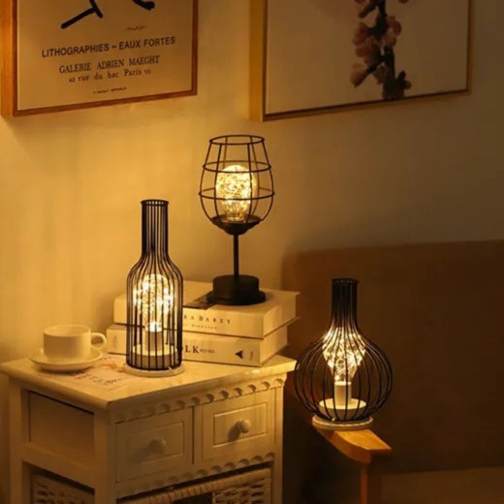 Decorative table lamps on a nightstand with warm lighting