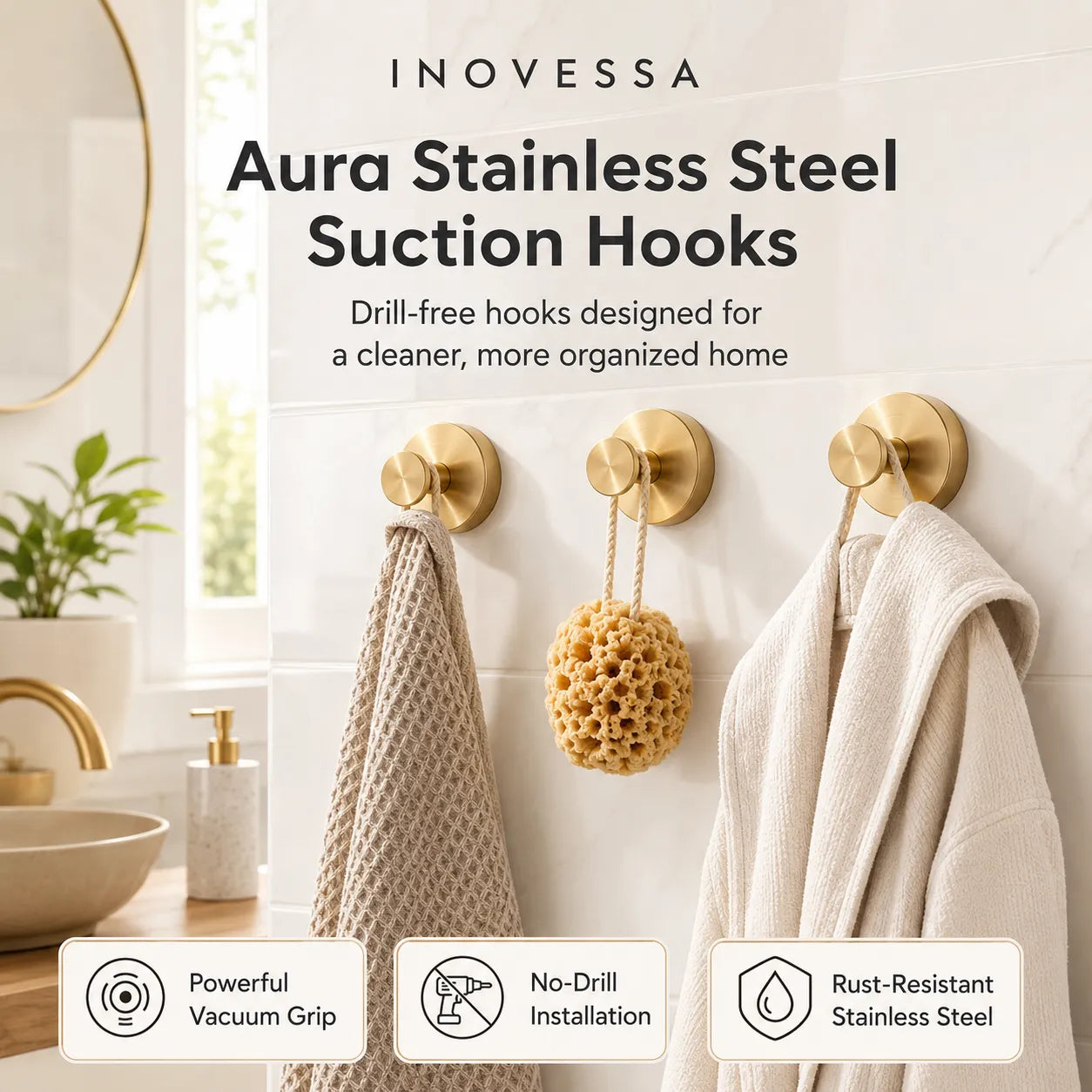 Inovessa Aura Stainless Steel Suction Hooks in a bathroom setting with towels and a sponge.