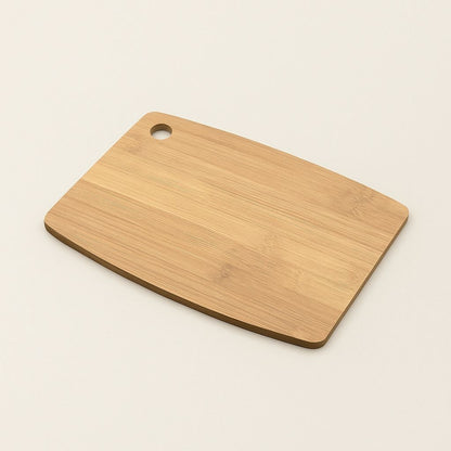 Bamboo chopping board with knife-protecting surface and easy storage ring, eco-friendly kitchen organization