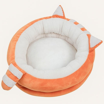 Gray round pet bed featuring ear accents and cotton filled interior