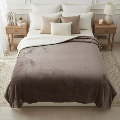 Coral velvet sherpa blanket with dual sided fleece design for warmth and comfort