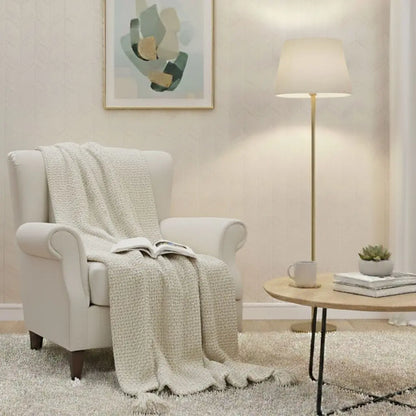 Folded cashmere knit blanket with tassel trim for home use