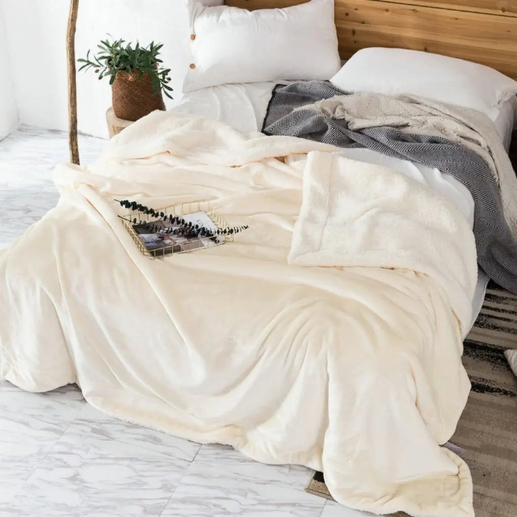 Sienna coral velvet throw blanket with sherpa fleece lining for bed or sofa use