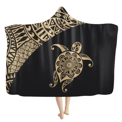 Flannel hooded blanket with turtle centerpiece and bohemian border pattern for warmth