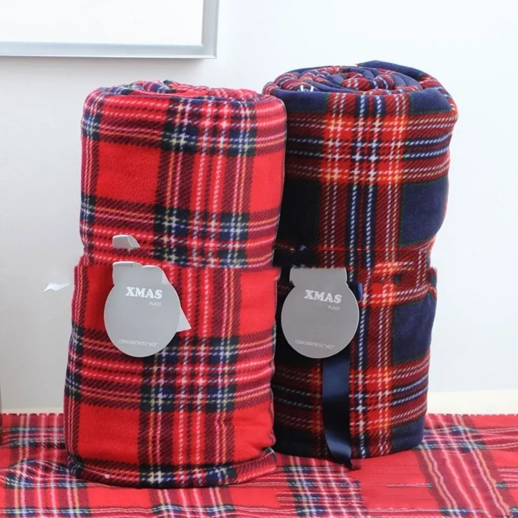 Flannel plaid blanket in red checkered fleece for cozy home comfort