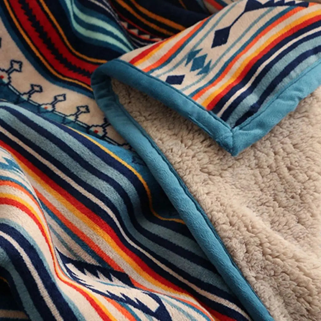 Plush throw blanket with geometric design perfect for snuggling during chilly evenings