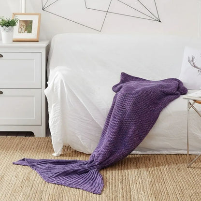 Acrylic knit blanket with sculptured tail detail and unique wraparound design for adults