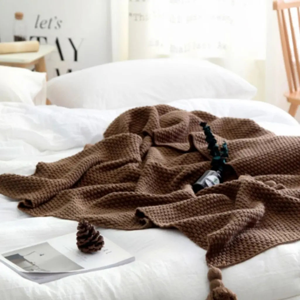 Textured knit weave blanket with tassel fringe for versatile indoor use
