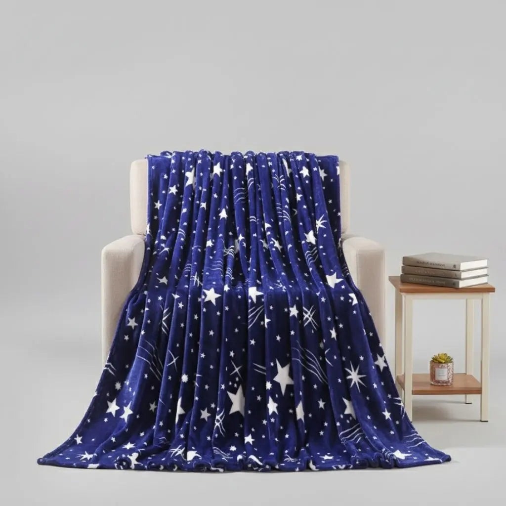 Flannel blanket with starry night constellation pattern in dark blue polyester fabric