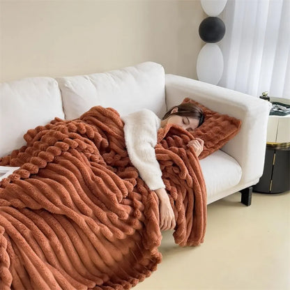 Textured polyester flannel blanket with heavy weight construction for comfort