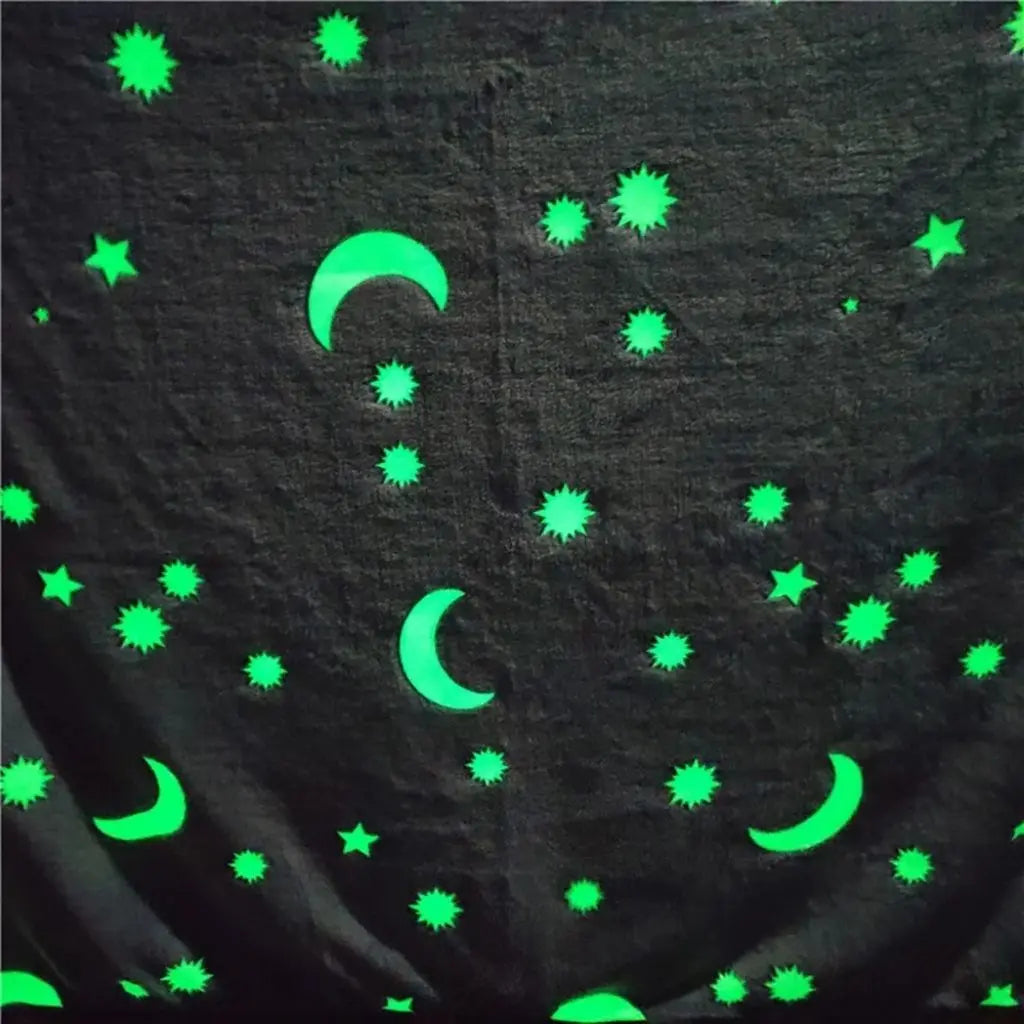 Illuminated blanket creating calming starlit atmosphere for restful sleep in dark bedroom